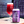 An enticing can of Gadget Mixed Berry Fruit Tart remarkable liquid poured into a beautiful glass. Vibrant colors and captivating flavors in every sip.